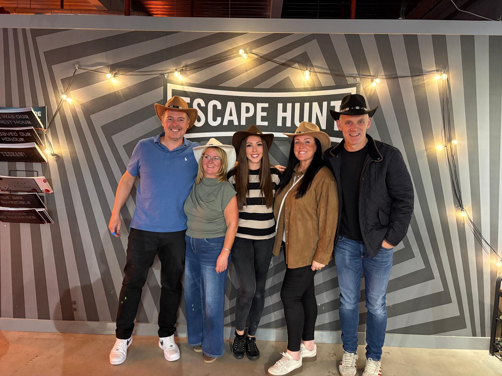 3d Leisure Team Members taking page in an escape room